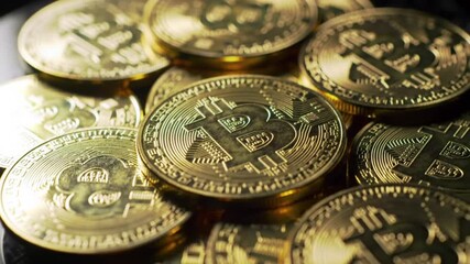 Poster - Pile of Gleaming Golden Coins with Intricate Designs on Dark Background for Business and Finance Investments