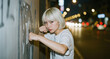 © Everlasting Dreams - Rebellious teenage Japanese women punching a graffiti street wall at night in Tokyo, flash photography outdoors photoshoot