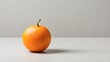 © Black Panda - Single Orange on Neutral Background Minimalist Still Life Photography