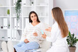 © Pixel-Shot - Young woman visiting gynecologist in clinic