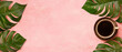 © nattapon98 - Coffee cup with tropical green leaves on pink background creating fresh and relaxing atmosphere for break or morning routine