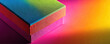 © iwaart - Colorful textured gift box on vibrant gradient backdrop created by soft light during a creative photography session