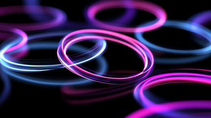 Leinwandbilder - Glowing rings in pink and blue floating on a black background creating depth