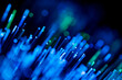© ADDICTIVE STOCK - Abstract pattern of blue and green fiber optic lights