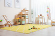 © New Africa - Stylish playroom with toys and furniture. Interior design