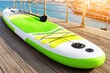 © gwood - Inflatable Stand Up Paddleboard on a Dock