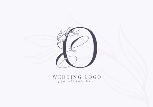 Elegant wedding logo with floral initial EO monogram