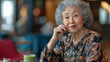 © Iuliia Metkalova - Elderly Senior Woman Embracing Beauty Rituals in a Modern Nursing Home with Makeup Tools and Healthy Smoothie on Table