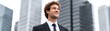 © JK_kyoto - Close up leadership success concept, confident businessman smiling outdoors in urban office setting, corporate growth vision, for Advertise, for banner, with copy space