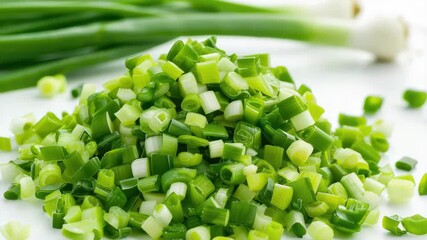 Aufkleber - A pile of chopped green onions on a white surface, great for food photography and recipes