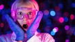 © chusnul - Young scientist in a lab coat and goggles expressing surprise against a colorful bokeh background