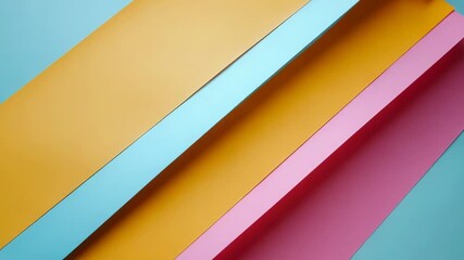 Aufkleber - A stack of various colored papers placed on a blue surface