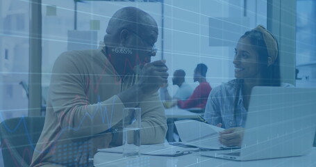 Poster - Discussing senior man and woman reviewing documents at office table with data charts overlay