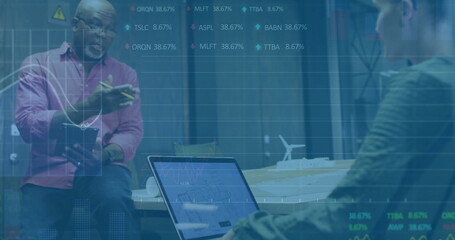 Poster - Gesturing senior man holding notepad in conference room, with laptop and turbine model, copy space