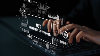 Fototapete - Hands Typing on Laptop with IoT Internet of Things Interface and Data Visualization in Dark Environment. Asymptotic smart data analytic.
