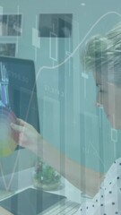 Poster - Animation of statistical data processing over female graphic designer holding a color palette