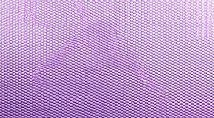 Close up of a textured purple mesh fabric with a subtle pattern isolated on white background