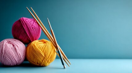 Poster - Three balls of yarn are stacked on top of each other