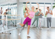 © JackF - Ballet training for teenagers in a ballet studio under the guidance of a choreographer