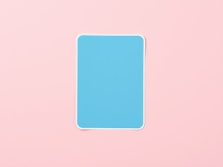 Poster - A light blue rectangle with rounded corners and a white border on a light pink background overhead shot