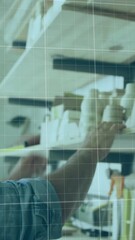 Poster - Animation of red graph processing over caucasian male carpenter at work in workshop