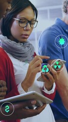 Poster - Animation of ecology icons over diverse colleagues using tablet in office
