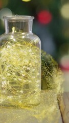 Poster - Glowing yellow particles animation over jar with lights on wooden surface