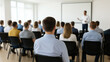 © AiDesign - Business seminar with audience seated and listening to male speaker in conference room during corporate training presentation, team development session, education, communication, and leadership event
