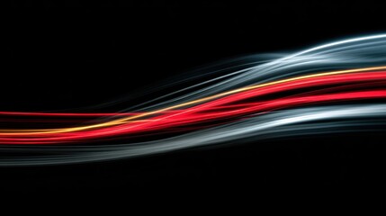 Poster - Dynamic light trails create a sense of motion and energy against a dark background, perfect for abstract design.