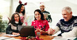 © peopleimages.com - Celebration, colleagues and laptop in office, Christmas or happy for financial success and laughing. Online, boss and people with Xmas sweater in festive season, excited and achievement for business