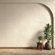 © bakri - Minimalist interior scene with speckled beige wall, arched alcove, wooden stool, and potted plants on a wood floor