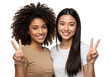 © Vooglo.com - Two diverse young women, one with curly hair and one with straight hair, smile and flash peace signs isolated on a transparent background