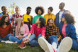 © DisobeyArt - Group of diverse people having fun outdoor at city park - Diversity, lifestyle and multiracial community concept - Main focus on center african girl face