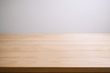 Poster - Empty wooden table surface in minimal modern interior with blank background.