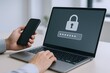 © Generative AI - Person Using Smartphone and Laptop with Digital Security Lock Screen in Modern Workspace.