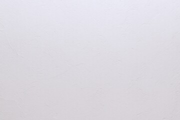 Poster - Minimalist White Wall Background with Subtle Texture for Design and Decoration.