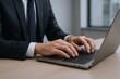 © Generative AI - Businessperson Desk Work Typing Laptop Office Work Technology Workplace.