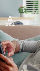 Poster - Animation of digital people icons over man using tablet