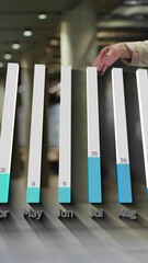 Poster - Shaking hands, business people with bar graph showing monthly data animation