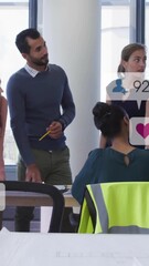 Poster - In school, business team discussing with animation of social media icons overlaying