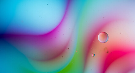 Poster - Abstract background with vibrant colors and water droplets creating a dreamy and ethereal effect