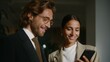 © Богдан Скрипник - Professionals discussing ai recruitment on smartphone in modern office setting
