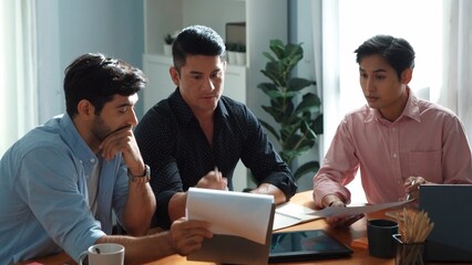 Poster - Executive manager explain financial graph to colleague at meeting room. Top aerial view of diverse marketing team sharing idea and planning strategy while sitting at table with tablet. Convocation.