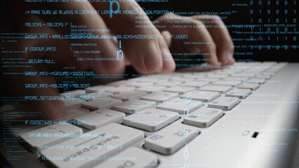 Fototapete - A close-up view of hands typing on a laptop keyboard against a backdrop of flowing code, showcasing the intricate world of technology and information security in modern work environments. Xenic