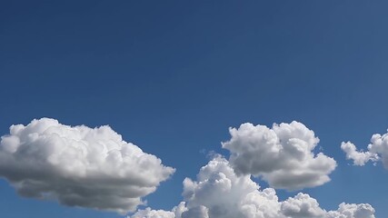 Wall Mural - beautiful cinematic time lapse of soft white clouds expanding across a bright blue sky creating a majestic open air scene of nature’s grandeur perfect for meditative or time themed media in high