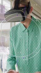 Aufkleber - Animation of scope scanning and data processing over caucasian woman using vr headset