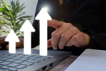 Poster - Businesswoman pointing at an upward graph made of arrows, concept of sales success