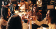 © peopleimages.com - Happy women, friends and night with cheers in restaurant for celebration, toast or get together. Female people, group or evening out with wine glasses, drink or alcohol for social gathering or event