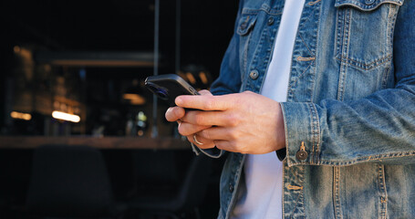 Phone, cafe and hands of person at front door for delivery tracking, communication and contact. Restaurant app, online order and coffee shop schedule with man for social media and survey rating