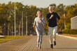 © Studio Romantic - Active senior pair running, sporty physically energetic older man and woman outdoor jogging. Elderly people on street physical exercise, enjoying open air activity to boost mood, energy levels, memory